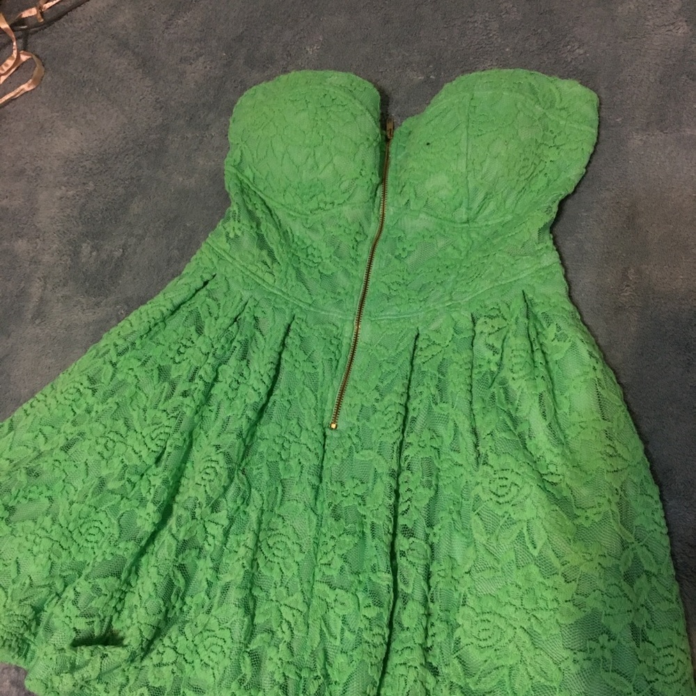 Strapless green dress.